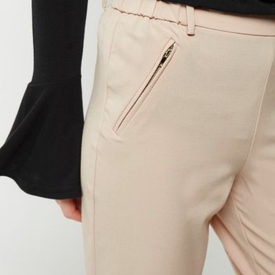 Pink zip detail trousers